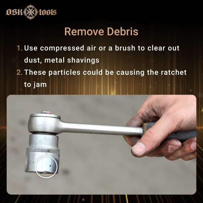 remove debris-ratcheting wrench locked up